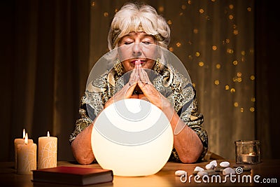 Predicting future from crystal ball Stock Photo