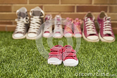 Pregnancy announcement with sneakers Stock Photo
