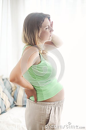 Pregnancy, motherhood- close up of pregnant woman Stock Photo