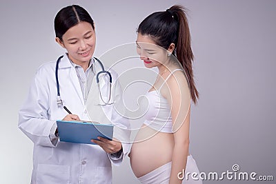 Pregnancy, motherhood, people, medicine and fertility concept Stock Photo