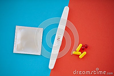 Pregnancy test. The result is positive with two strips. Treatment of infertility with pills, help in conceiving a child. Tablets Stock Photo