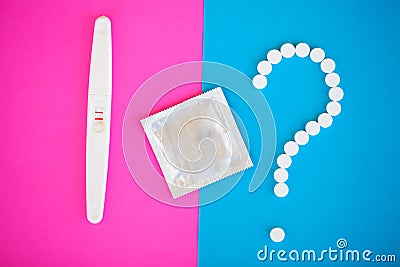 Pregnancy test. The result is positive with two strips. Treatment of infertility with pills, help in conceiving a child. Tablets Stock Photo