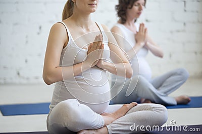 Pregnancy Yoga meditation in class Stock Photo