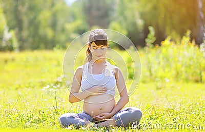 Pregnant beautiful woman yoga Stock Photo