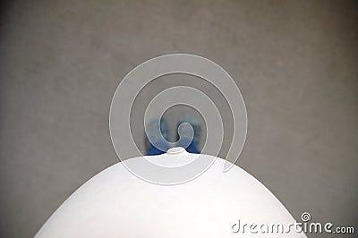 Pregnant belly woman, top view from above. Self shoot. Expecting baby birth in third trimester for being mother. Prenatal period Stock Photo