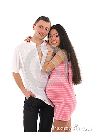 Pregnant couple Caucasoid father, mother asian Stock Photo