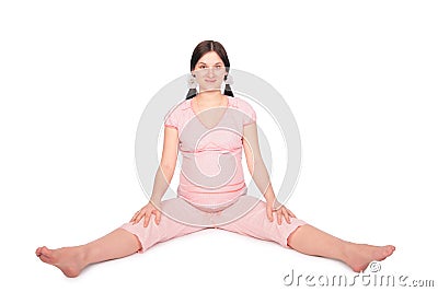 Pregnant girl trainning on floor Stock Photo