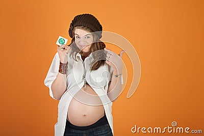 Pregnant Lady with Condom Stock Photo