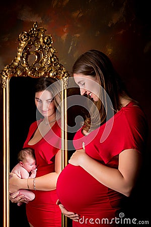 Pregnant mirror dreams of a baby Stock Photo