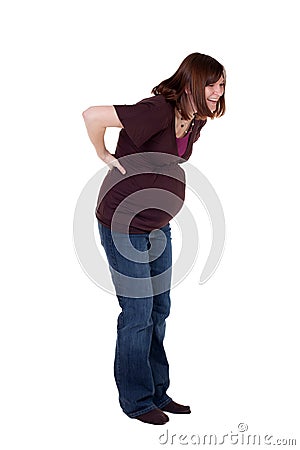 Pregnant Mother Holding Her Back Stock Photo