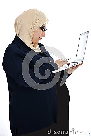 Pregnant Muslim Arabic woman Stock Photo