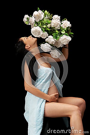 Pregnant with roses Stock Photo