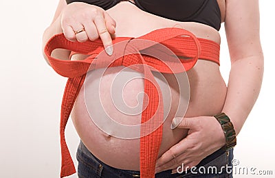 Pregnant with stripe and bowknot on white Stock Photo