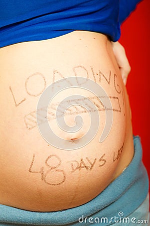 Pregnant woman belly with drawings Stock Photo