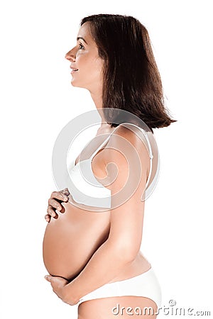 Pregnant woman belly profile side view thinking pensive Stock Photo
