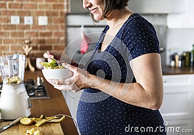 Pregnant woman eat healthy food Stock Photo