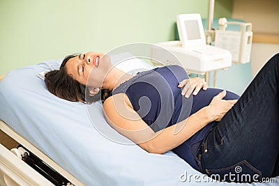 Pregnant woman going into labor Stock Photo