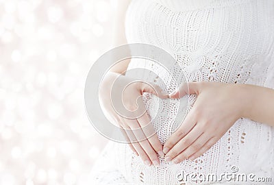 Pregnant Woman Heart Shape, Pregnancy Concept, Maternity Belly Stock Photo