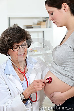 Pregnant woman at her gynaecologist. Stock Photo