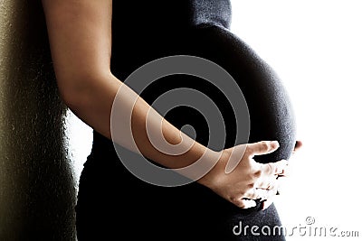 Pregnant Woman Holding Belly Stock Photo