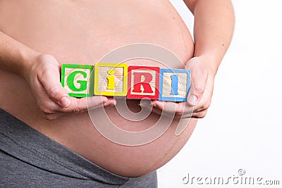 Pregnant woman holding girl world Stock Photo