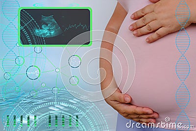 Pregnant woman holds her belly, ultrasound screen examination, small child rolls over in mother`s belly, concept pregnancy Stock Photo