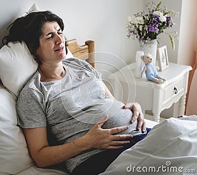 Pregnant woman with labor pain Stock Photo