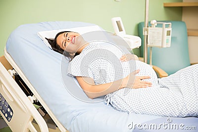 Pregnant woman with labor pains Stock Photo