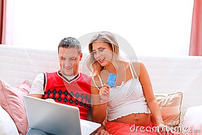 Pregnant woman making on-line purchases Stock Photo