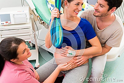 Pregnant woman preparing herself for giving birth Stock Photo