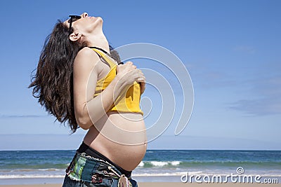 Pregnant woman showing paunch Stock Photo