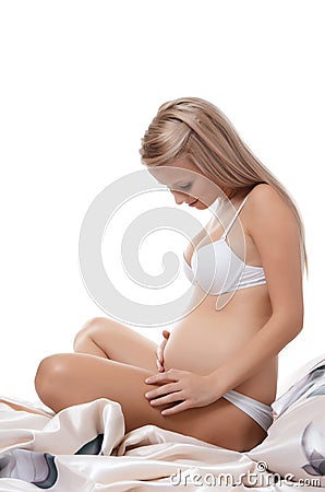 The pregnant woman sits Stock Photo