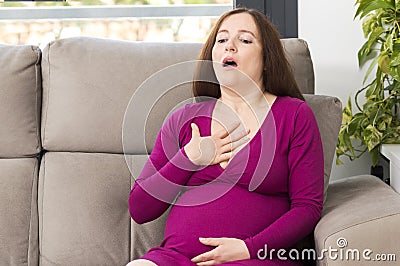 Pregnant woman suffering respiration Stock Photo