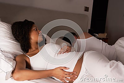 Pregnant woman unable to sleep Stock Photo