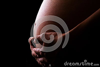Pregnant women belly Stock Photo