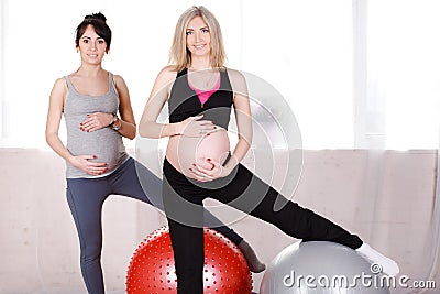 Pregnant women with large gymnastic balls Stock Photo
