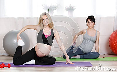 Pregnant women are a special set of exercises Stock Photo