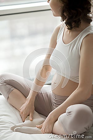 Pregnant Yoga Woman Doing Butterfly Pose Stock Photo