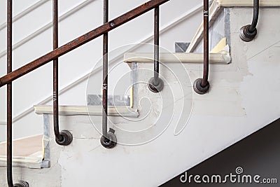 preliminary installation of decorative fasteners of metal handrails to steps Stock Photo