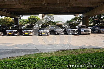 Premium Black Taxi waiting arrival passengers in front of Airport Gate Editorial Stock Photo