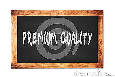 PREMIUM QUALITY text written on wooden frame school blackboard Stock Photo