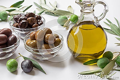 Premium virgin olive oli and variety of olives. Stock Photo