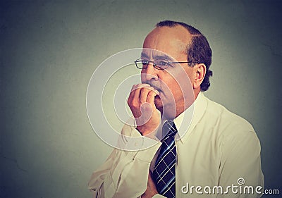 Preoccupied anxious concerned middle aged business man in glasses Stock Photo