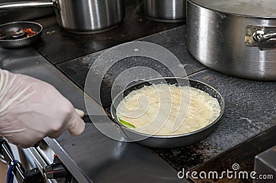 Preparation of bechamel sauce Stock Photo