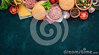 Preparation of burger. Meat, tomatoes, onions. Stock Photo