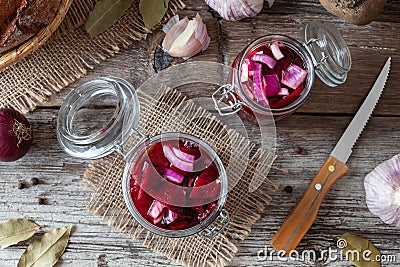 Preparation of fermented beet kvass in two jars Stock Photo