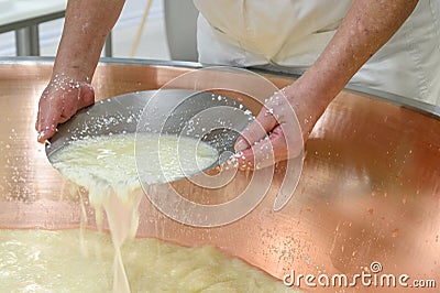 Preparation of the Grana Padano cheese Stock Photo