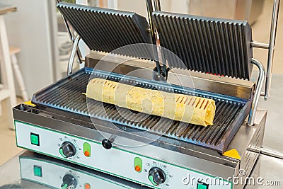 Preparation of shawarma on an electric furnace Stock Photo