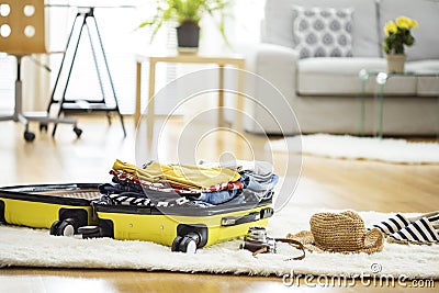 Preparation travel suitcase at home Stock Photo