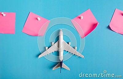 Preparation for Traveling concept, paper noted, airplane, push pin. Stock Photo